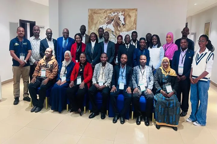 Participants pose for a group photo